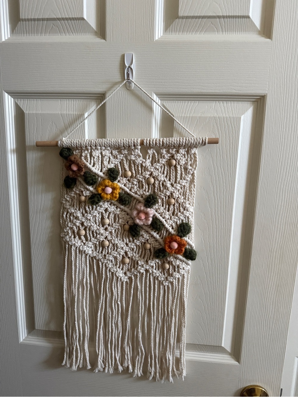 Handwoven Cream Macrame Wall Hanging with Floral Accents